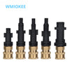 Five heavy-duty quick release adapters for pressure washers in black and brass finish.