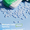 A green dinosaur foam airplane launcher toy with multiple color options scattered on a light blue background.