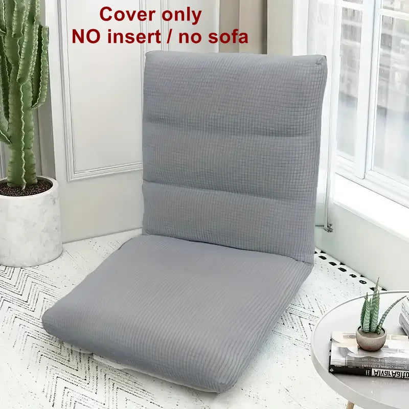 Gray foldable floor sofa cover for a single seat or lounger shown on a white surface.