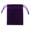 A deep purple velvet drawstring jewelry pouch with purple ties.