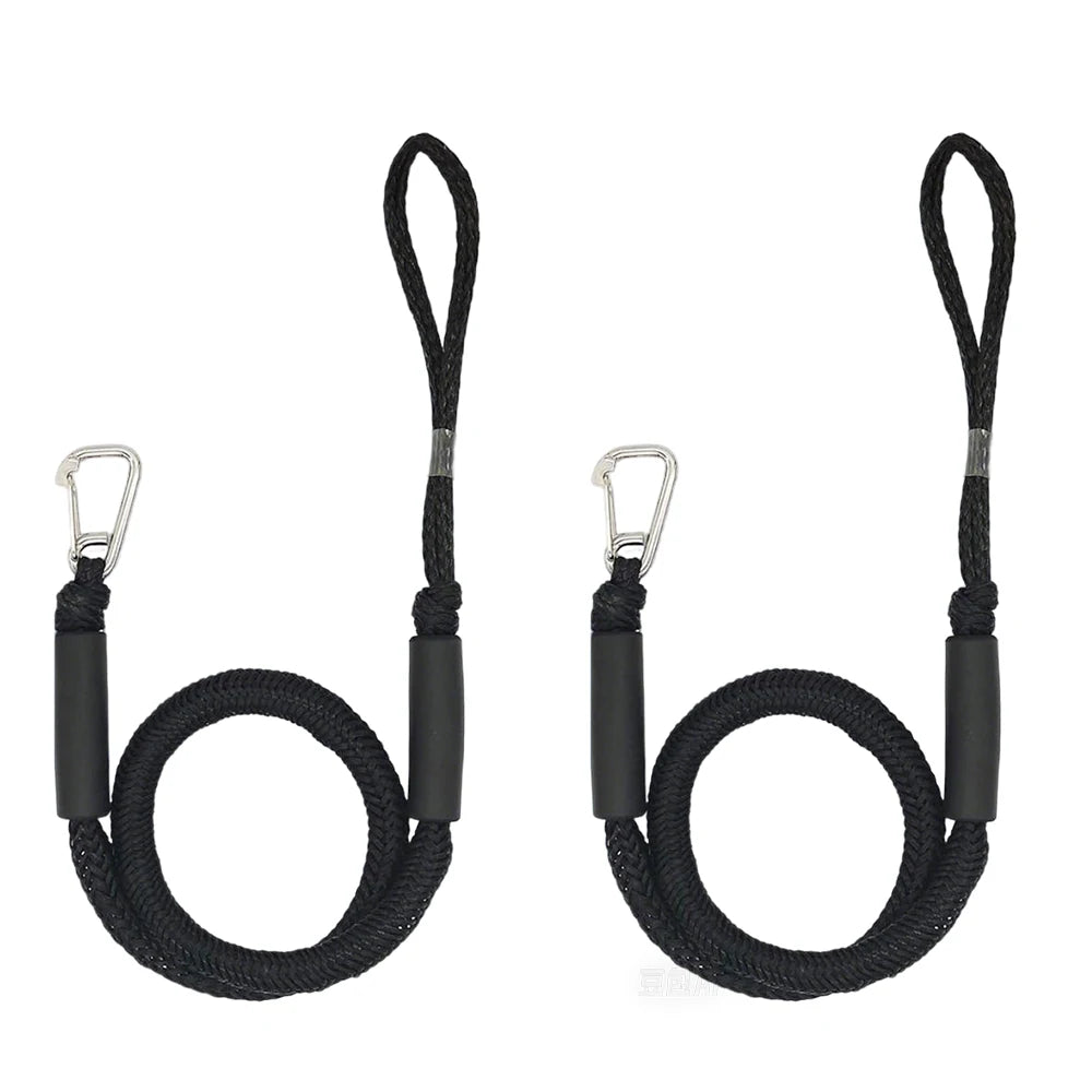 A pair of black elastic marine dock lines with metal clasps and shock absorption features.
