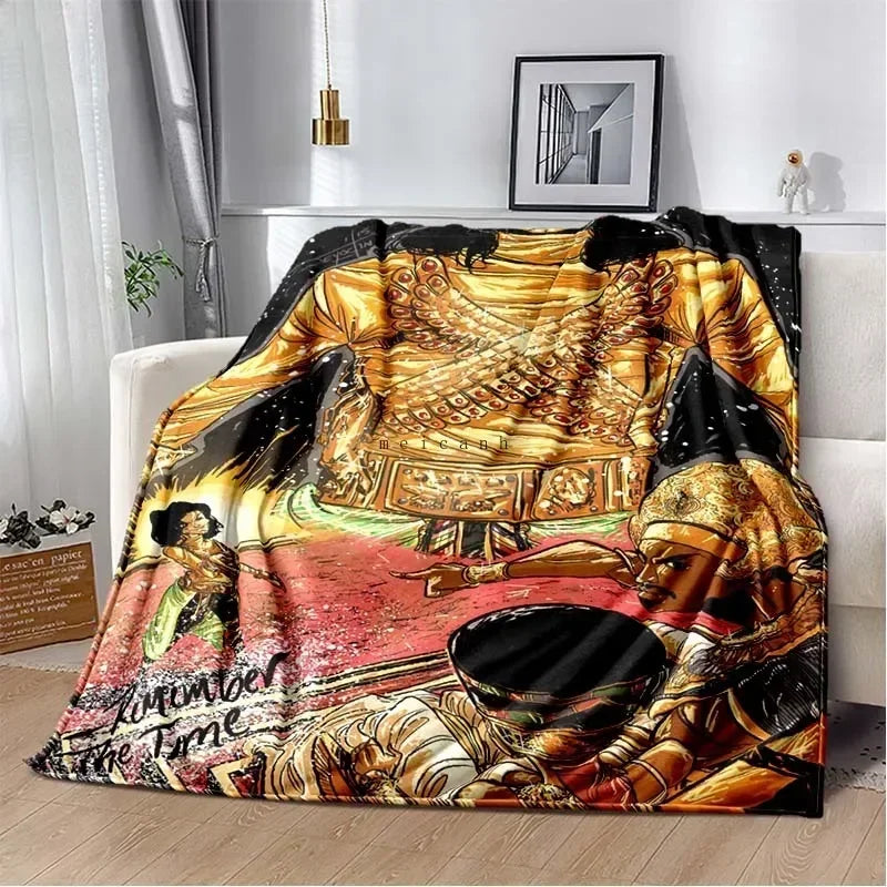 A black and gold print flannel throw blanket featuring a portrait of Michael Jackson.