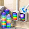 A wall-mounted dispenser for disposable toilet cleaning refills with colorful, stacked cylindrical tubes.