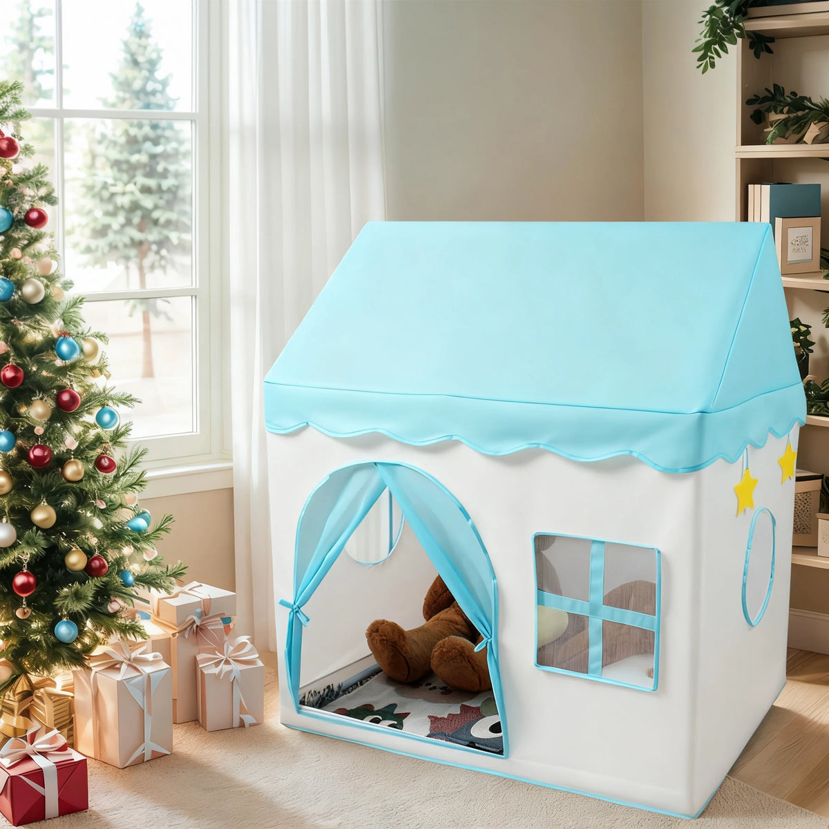 A white playhouse tent with a light blue roof and arched entrance, decorated with stuffed animals and flowers.