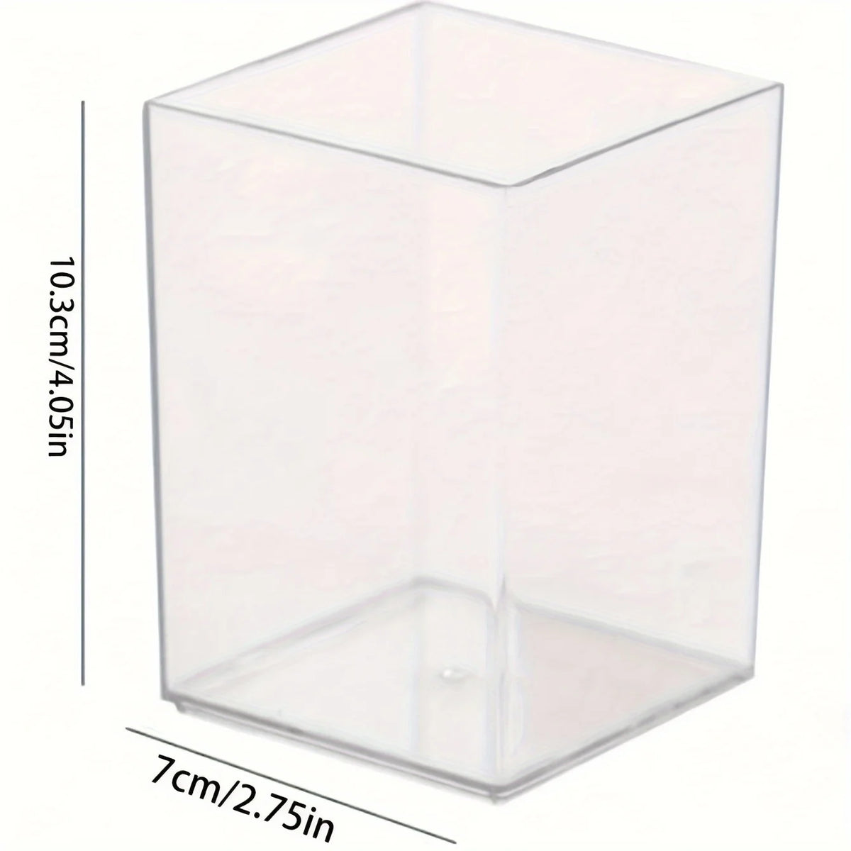 A clear acrylic rectangular pen holder with dimensions 10.3cm by 7cm.
