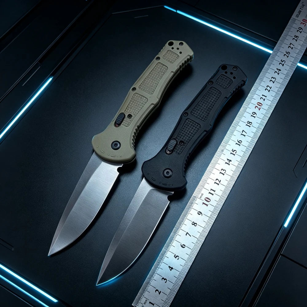 A folding pocket knife with a D2 steel blade and anti-slip handle is displayed next to a ruler on a dark surface.