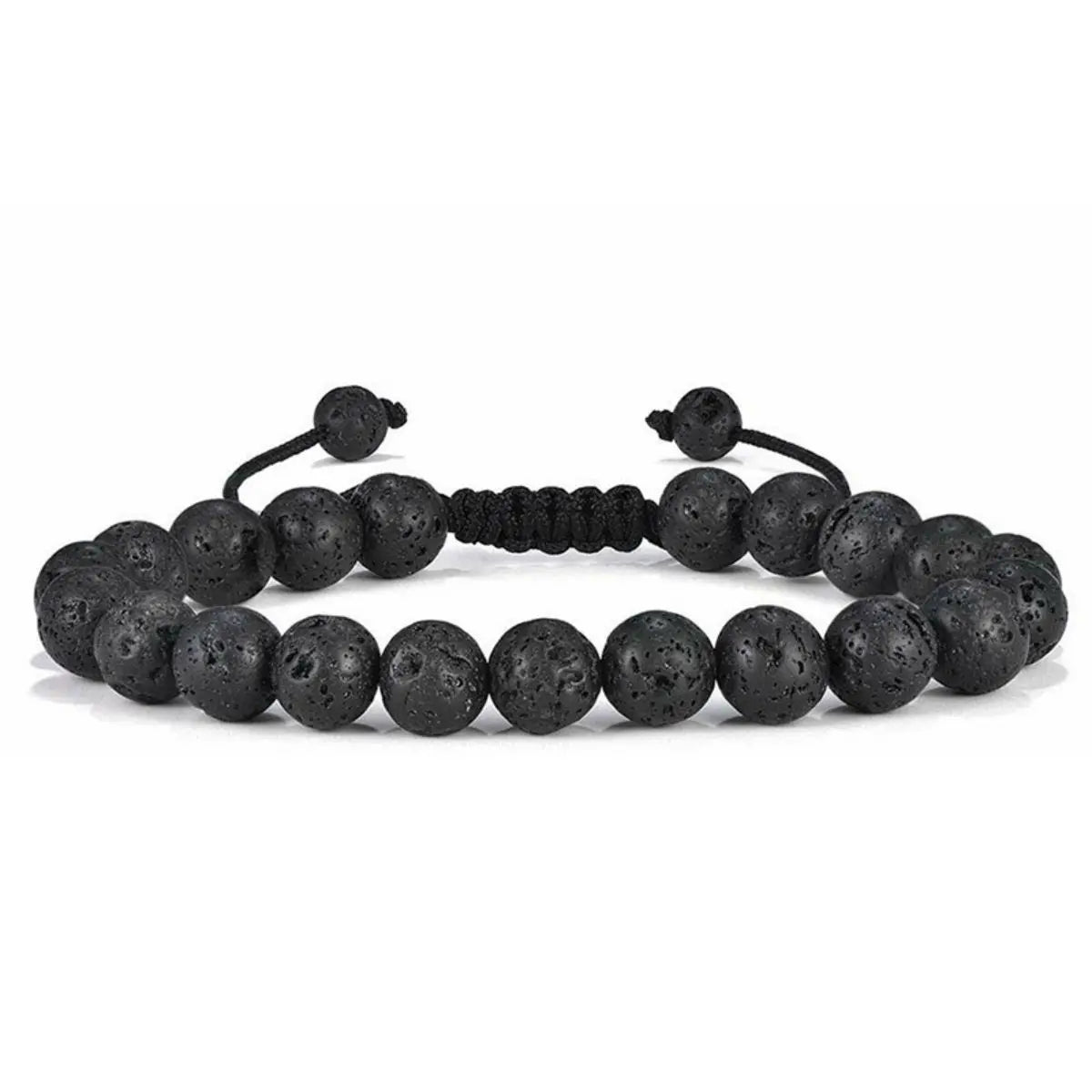 Un ensemble de bracelets à perles en pierre naturelle noires disposés sur un fond blanc.