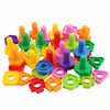 A collection of colorful plastic screw and nut building blocks for children.