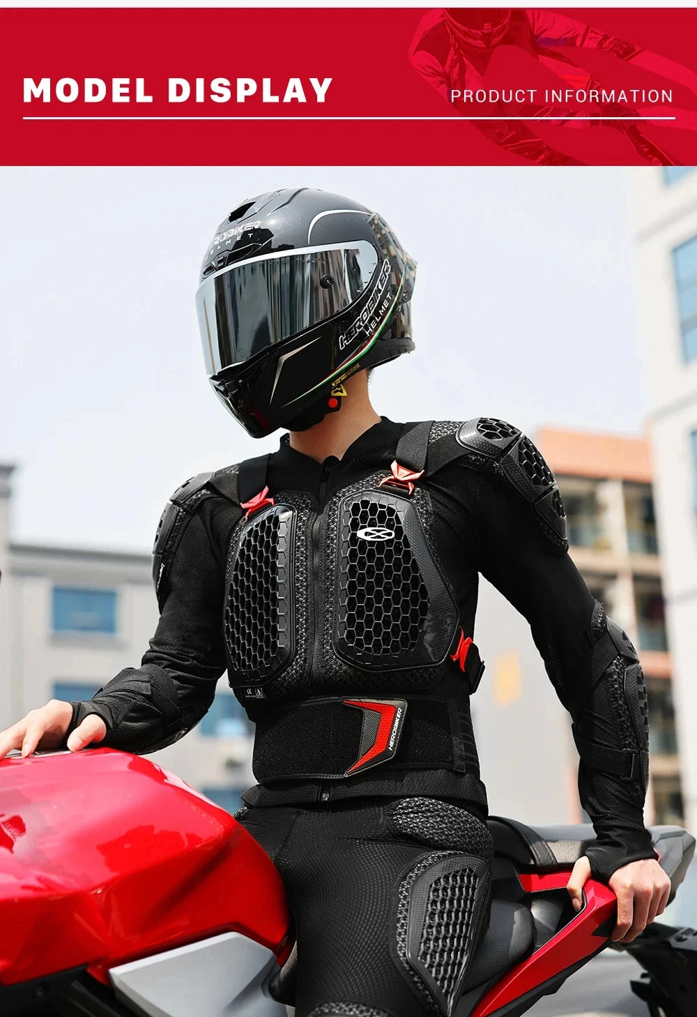 A person wearing a black motocross armor jacket with chest and back protection is shown next to a red motorcycle.