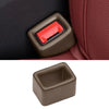 A protective cover for a car seatbelt buckle, shown in brown and red colors.