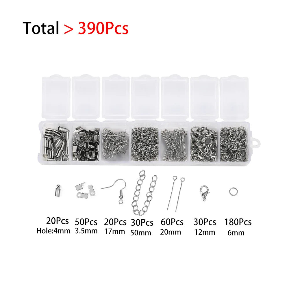 A set of jewelry making components including various sizes of jump rings, clasps, and crimps for crafting.