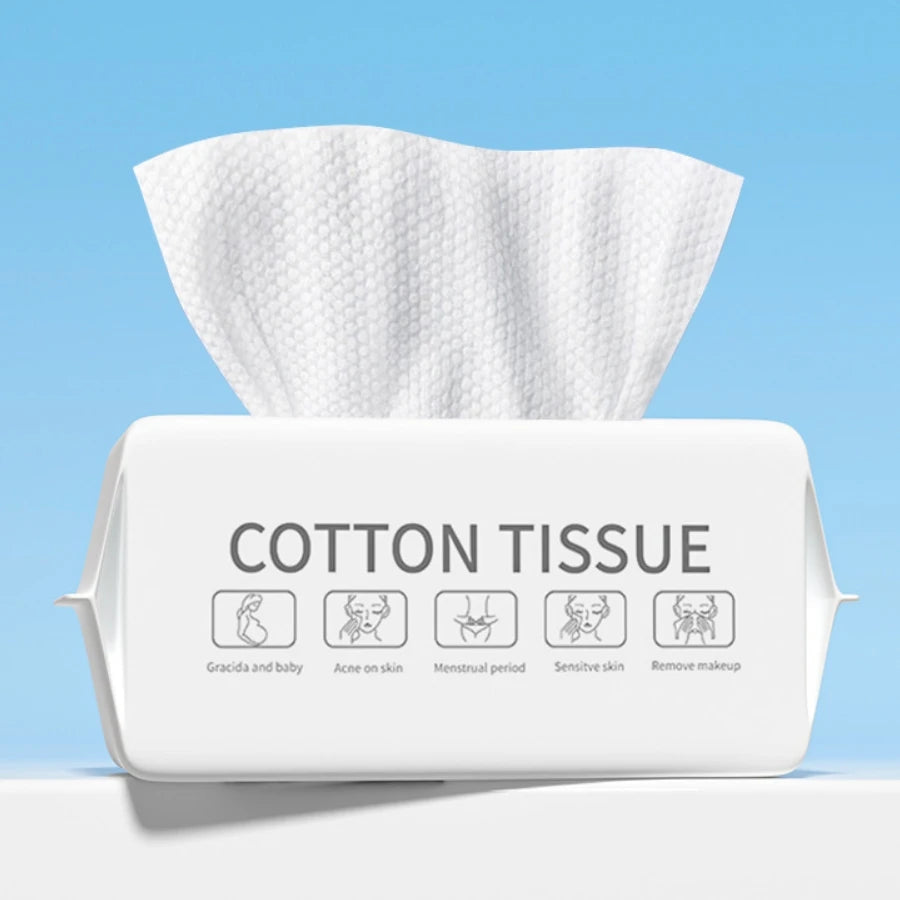 Paquete blanco de pañuelos de algodón con iconos que indican usos como para bebé, acné, periodo menstrual, piel sensible y ma
