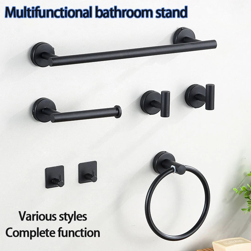 A black multifunctional bathroom stand featuring a towel bar and a ring hook mounted on a white wall.