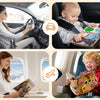 A woman uses a Montessori giraffe busy board quiet book with a toddler in the car and another child playing with it.