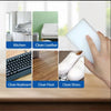 A hand is using a white cleaning sponge to clean various household items including a kitchen, leather, keyboard, floor, and s