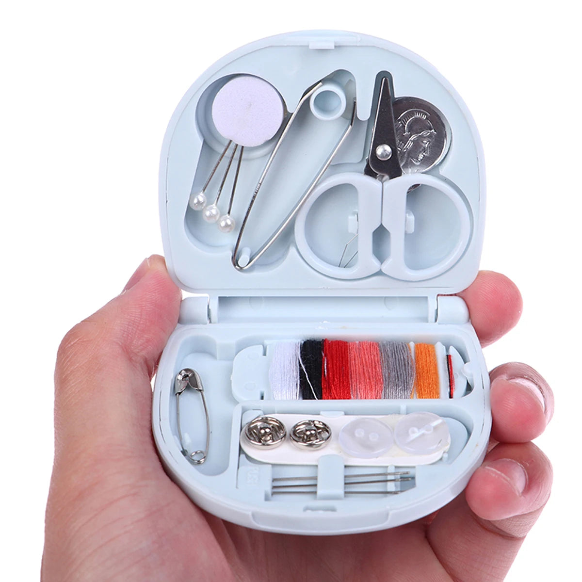 A portable mini sewing kit with various tools including needles and thread spools is shown in an open case.