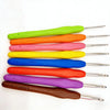 An arrangement of eight brightly colored crochet hooks and knitting needles in sizes ranging from 2mm to 6mm.