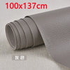 Roll of gray self-adhesive PU leather patch measuring 100x137 cm