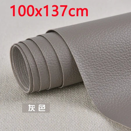 Roll of gray self-adhesive PU leather patch measuring 100x137 cm