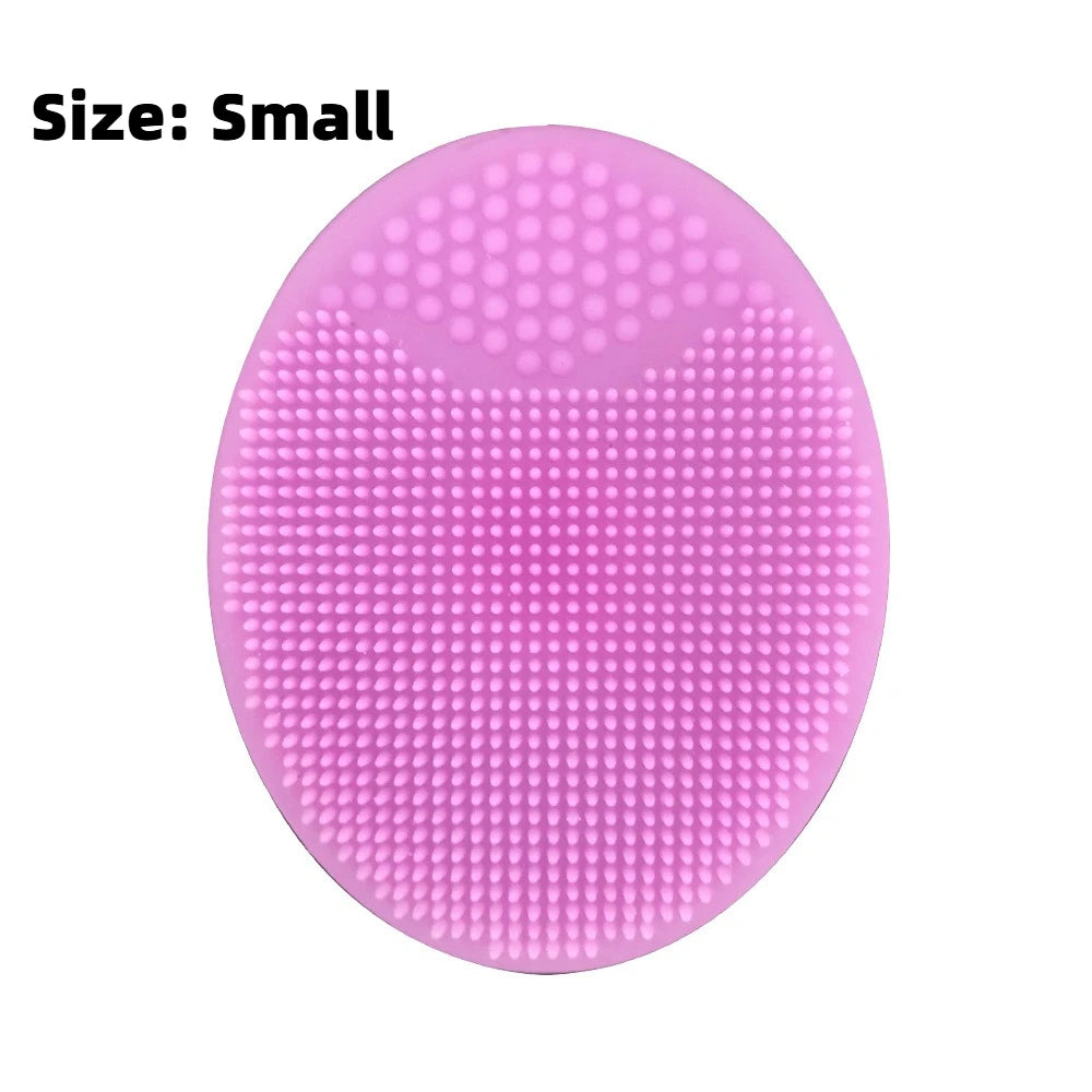 A small, pink silicone facial mask bowl with a textured surface and built-in tray.