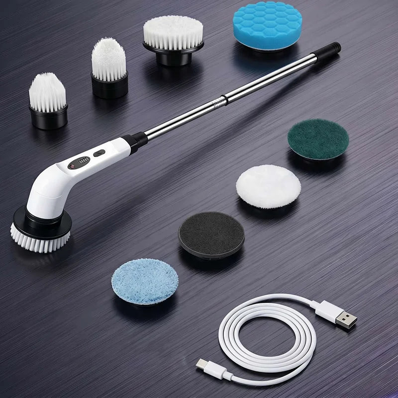 Cordless electric spin scrubber with interchangeable heads shown on a dark surface.