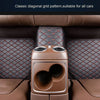 A close-up view of a car seat with classic diagonal grid pattern upholstery and brown leather trim.