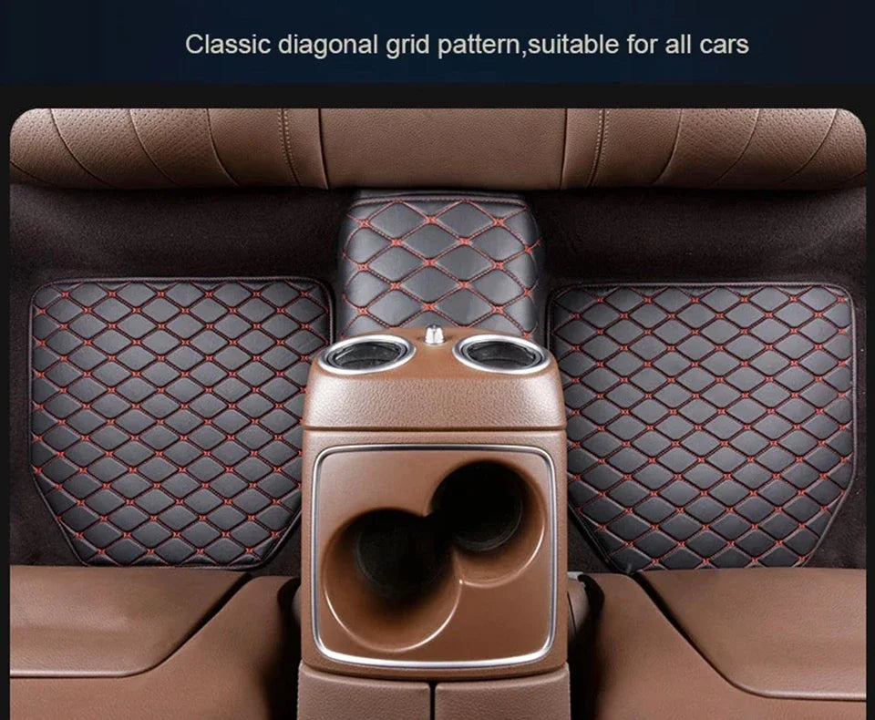 A close-up view of a car seat with classic diagonal grid pattern upholstery and brown leather trim.