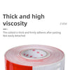 Roll of red and white reflective decals used for truck and vehicle applications