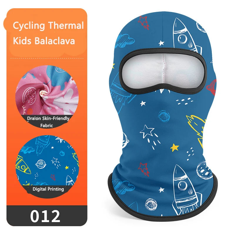 Blue cycling thermal kids balaclava mask featuring stars and rocket designs