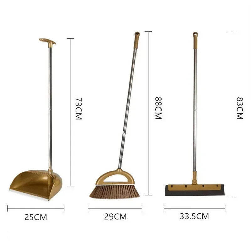 A set of a gold-colored broom and dustpan with a floor wiper, shown with various length measurements.