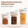 Three glass storage canisters filled with nuts, coffee beans, and pasta demonstrating various food sizes.
