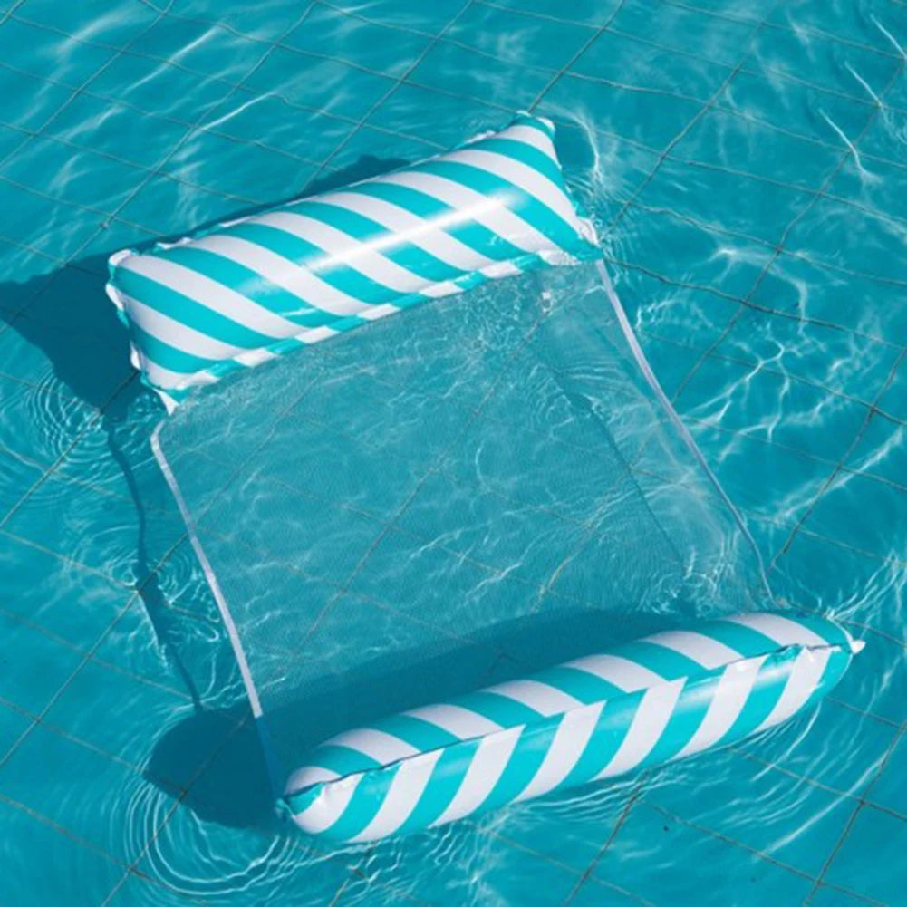 A foldable floating water hammock with white and teal stripes is shown floating on clear blue water.