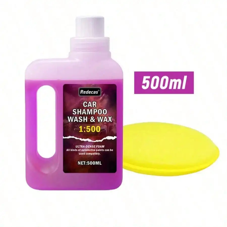 A purple plastic bottle of 500ml car shampoo wash and wax is shown next to a yellow foam disc.