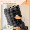 A person is hugging a fluffy gray rabbit stuffed pillowcase designed for winter warmth.