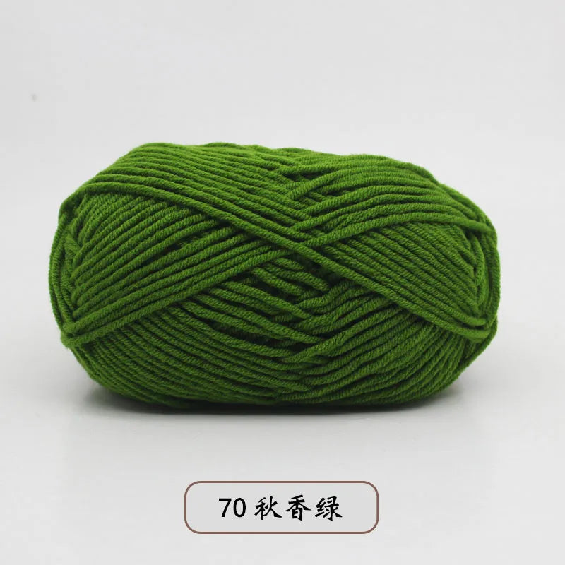 A ball of dark green 70-meter yarn for knitting and crochet
