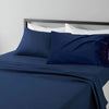 A dark blue microfiber bed sheet set with white pillows and a gray headboard.