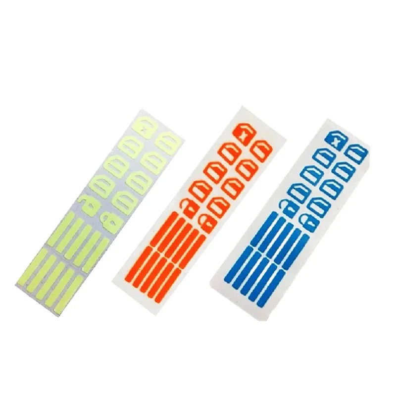 A set of glow-in-the-dark car window button stickers in various colors and patterns.