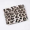 A black and beige leopard print PU leather card wallet.