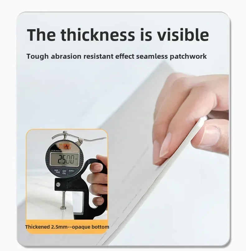A hand holds a white tile sticker, demonstrating the seamless patchwork effect and visible thickness of the product.