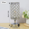 Silver crystal touch-sensor table lamp with USB charging ports on a wooden surface