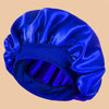 A vibrant royal blue satin wide brim shower cap for hair protection.