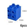 A set of six blue chunky building blocks with circular holes for connection.