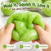 A hand holds a bright green squishy stress relief ball with a textured surface, demonstrating its soft and glossy feel.