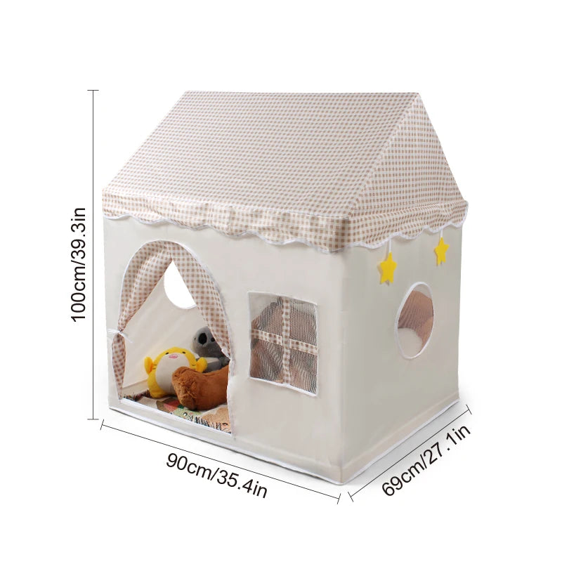 A light pink floral playhouse tent for kids with a pitched roof and decorative accents.