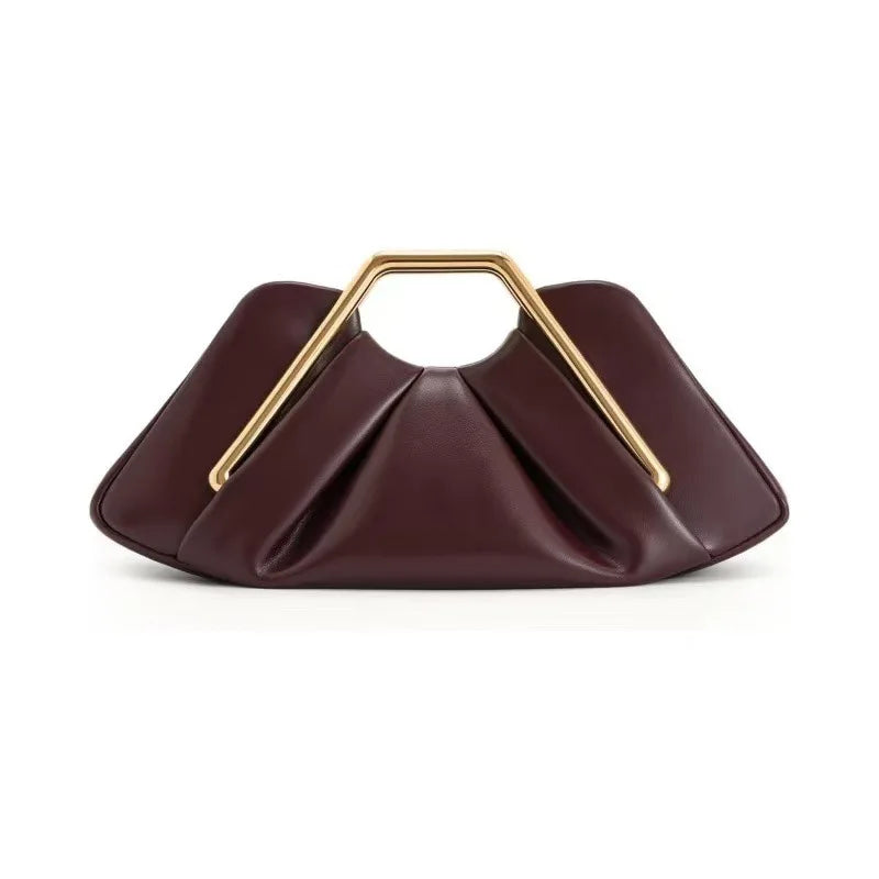 A dark burgundy soft PU leather crossbody bag with a gold-toned hardware detail.