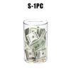 A clear acrylic piggy bank filled with various US currency bills and coins.
