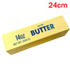 A yellow butter fidget stick with a 24cm length and 14oz net weight.
