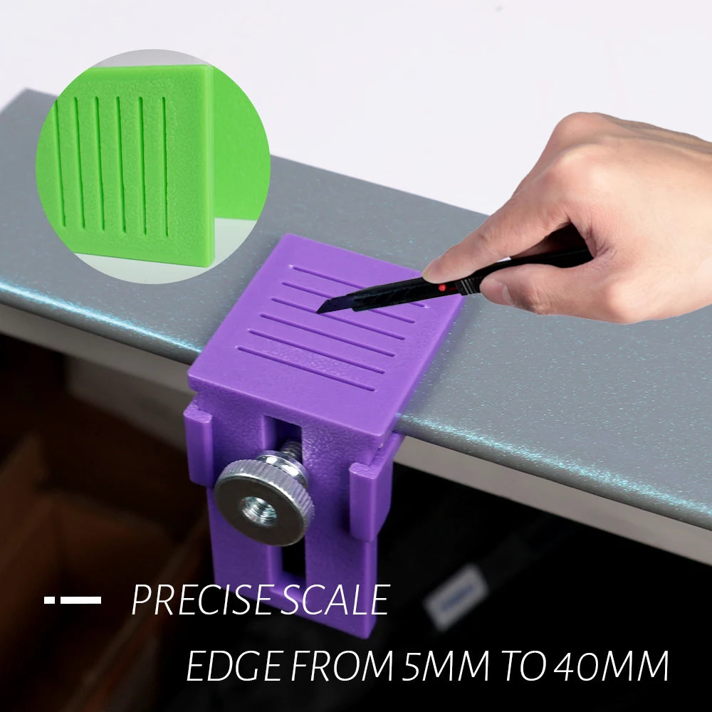 A hand uses a black pen to mark a purple vinyl cutting tool with a precise scale for edge measurements from 5mm to 40mm.