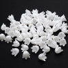 A pile of 100 white acrylic pearl spacer beads for jewelry making