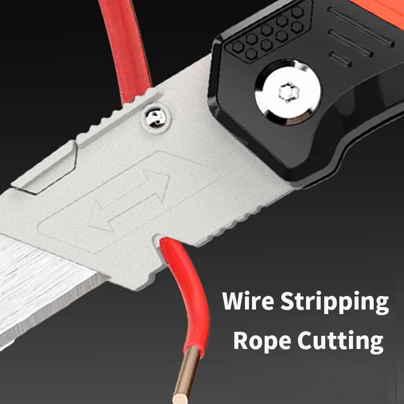 A close-up view of an SK2 hook utility blade with a red handle and storage case, designed for wire stripping and rope cutting